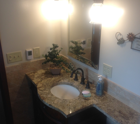 Dawson Contracting Inc - Marshall, MO. Complete Bathroom remodeling- floor to ceiling- Granit top provideing extra work space in small bath