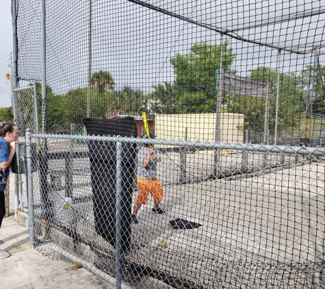 Safari Golf and Games - Vero Beach, FL. Katherine and William Lewis checking out the batting cages at Safari Golf and Games in Vero Beach, Florida.