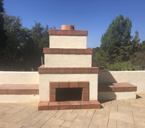 Prime Builders and Landscaping - Moorpark, CA. Fireplace with large hearth for seating