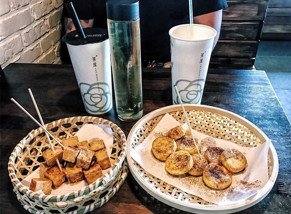 Tea House Formosa - Atlanta, GA. black milk tea, bottled iron goddess, spicy tofu on the left, tofu egg on the right @angelbabyyoyo