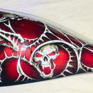 Fuel Tank Services - Fort Lauderdale, FL. Custom painted fuel tank left side. All work is done internally, preserving all artwork. Motorcycle fuel Tank services