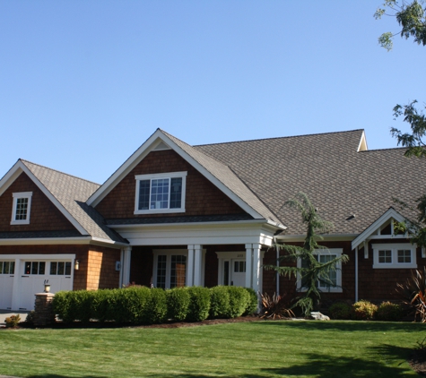 Town & Country Roofing Inc - Tumwater, WA. Town & Country Roofing installs asphalt shingle roofs.