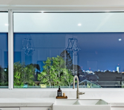 Bradnam's Windows & Doors - Kensington, QLD. White Aluminium Sliding Window