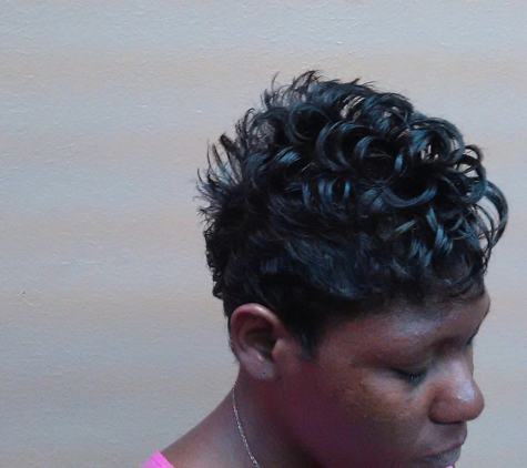 Nataesha Johnson - Short Hair Styles Specialist -Inside Southren Cuts and Stylez - Fort Worth, TX. After the process of relaxing,and cutting..I used a three step conditioning treatment on her hair..that brought life to her hair again..