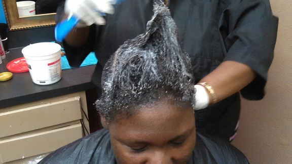 Nataesha Johnson - Short Hair Styles Specialist -Inside Southren Cuts and Stylez - Fort Worth, TX. This is a before pic,of the clients hair....she was natural but it wasn't growing and very damaged....