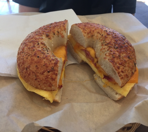 Sunrise Bagels Beaverton - Portland, OR. American Eggel with red onion added.