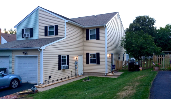 Install America - Mohnton, PA. Harleysville, PA siding project. New soffits, facia, gutters, shutters, and garage window, too!