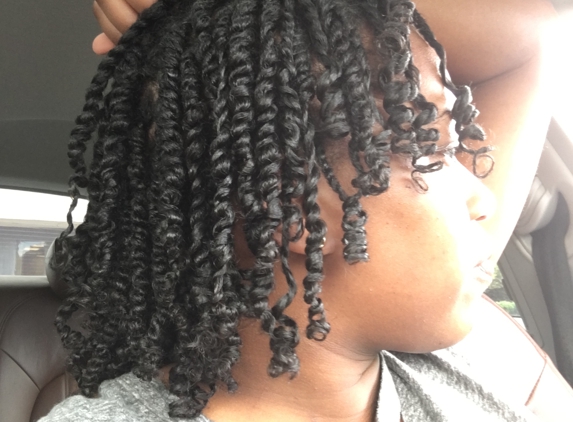 Natural Locs and Gifts - Mobile, AL. Two strand twist with rods