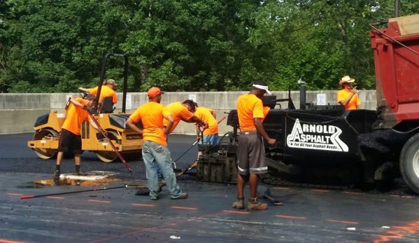 Arnold Asphalt - Bloomington, IN. New Parking Garage Install;  750 Tons of old aggregate tore out,  750 Tons of new aggregate installed.