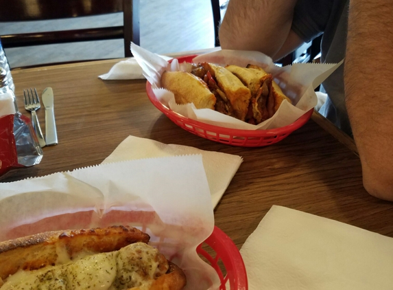 Pizza - San Antonio, TX. Meatball and Capos sandwiches : both were yummy.