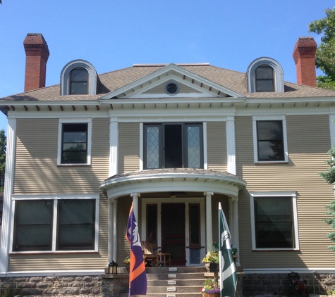 STP Painting and Remodeling - Traverse City, MI. Historical home off eighth st- repaint fully and restored. All dove tails and dormer lookouts replaced