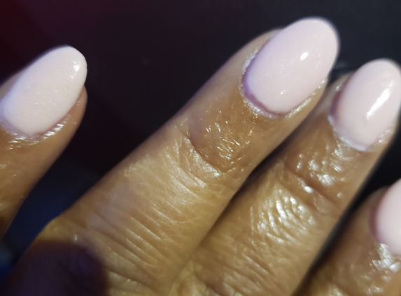 S Spa Nails - Milwaukee, WI. Misshapen nails.  Dip on cuticles.  Top of nails are not smooth.