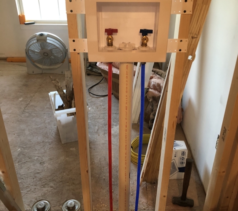 Cox Plumbing. Installed new washing machine box during construction