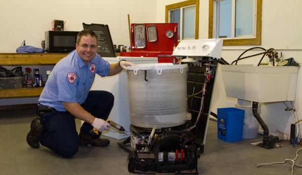 Appliance EMT LLC - Ogden, UT. The Owner, Blake, Repairing a Washer