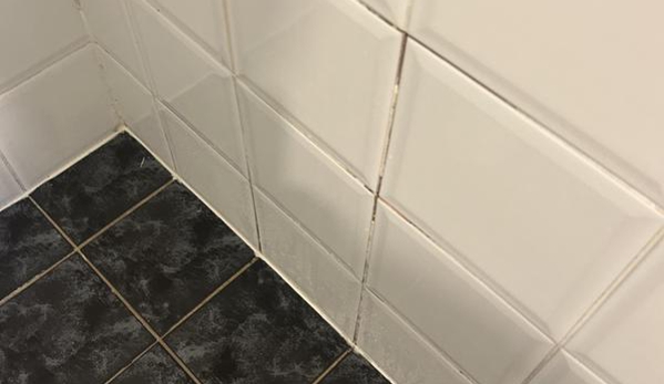 Advance Shower Repair and Bathroom Renovation - Taree, NSW. Before, shower wall was crummy with loose tiles