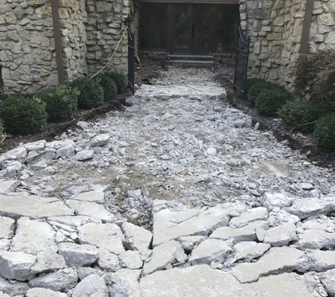 A touch of heaven landscapes - Indianapolis, IN. Total demolition and removal of concrete walkpath.