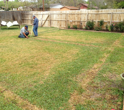Aaron Stuart Custom Irrigation - College Station, TX. Newly installed irrigation system after hand digging