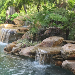 Waterfalls Fountains & Gardens Inc. - Lauderdale By The Sea, FL. Rock waterfall into pool in Miami, Florida