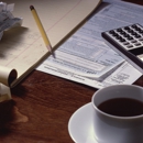 J. E. Wiggins & Co. Income Tax Service - Bookkeeping