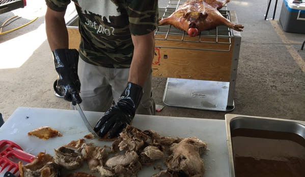 Truckee Horticulture Center - Truckee, CA. Roasted Pig at customer appreciation day!