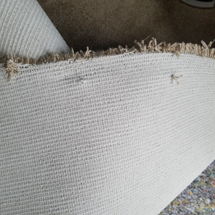Better Quality Carpets and Floors - Wixom, MI. Don't use them! 
They left seams and stapled the carpet to the floor