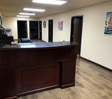 Integriteez - Tulsa, OK. Front desk and reception area.