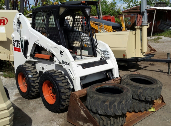 Big Yellow Steel - Opa Locka, FL. Skidsteers and air compressors