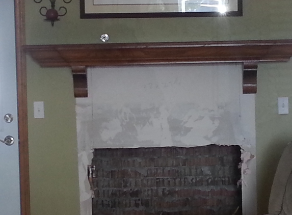 Woodline Enterprise LLC - Oklahoma City, OK. Mantle in process of installation.  We remove the old and install the new!