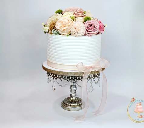 Madelyn's Specialty Cakes - Evans, GA. Topped with beautiful  artificial silk flowers