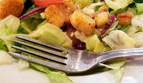 Red Rooster Grill - Omak, WA. Beautiful green side salad comes with pasta and steak dishes. 11 different side dressing options. I chose feta!