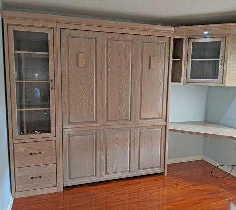 Accent Woodworking Inc. - Largo, FL. Traditional style Murphy Wall Bed with home office is shown in gray wash on oak.