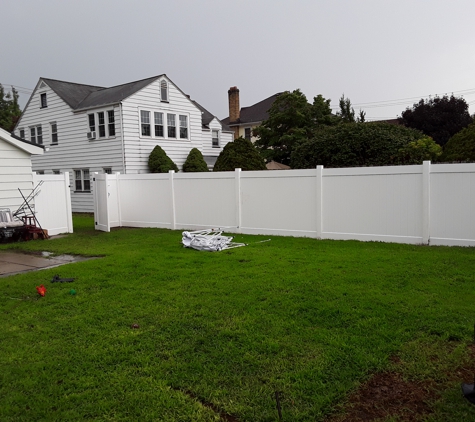 Powell's cutting edge landscaping - Wilkes barre, PA. Installation of a 6' privacy vinyl fence.