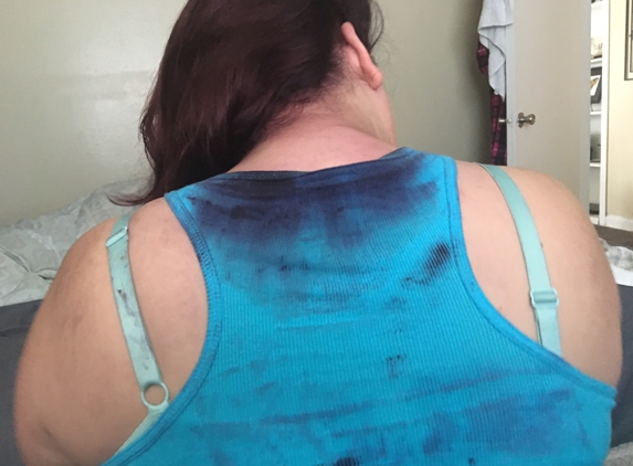 Hair Works Beauty Salon & Spa - San Antonio, TX. Stains all over my shirt and back