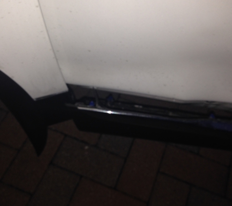 Tampa Auto Clinic - Tampa, FL. Damaged door panel, fender and trim.