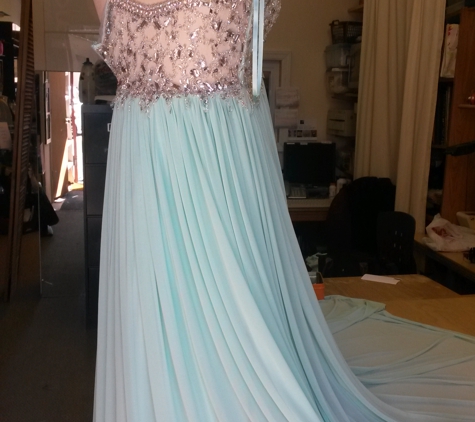 Zaraz Collection - Lynbrook, NY. Rebecca from Hewlett had alterations done on this evening gown - stunning !!