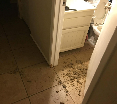 Reyna's Appliances - Phoenix, AZ. Before I cleaned the bathroom floor, right after damage