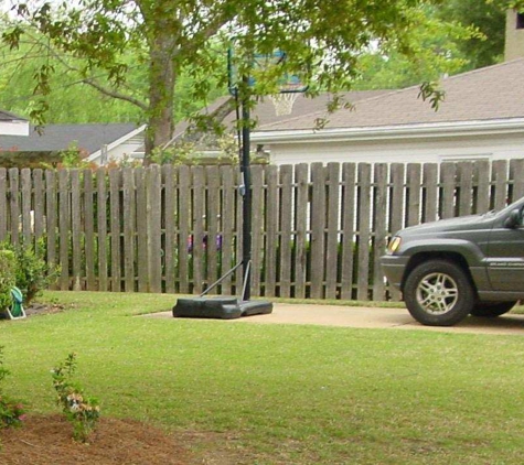 Pride Fence - Montgomery, AL. This is what our fence looked like before Roosevelt cut it down without our permission.. This fence sat on our property!