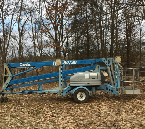 Russell Tree Service - Pinckney, MI. 55 ft portable lift. When a bucket can’t fit . This self propelling portable lift is light and is excellent for getting in where others cant