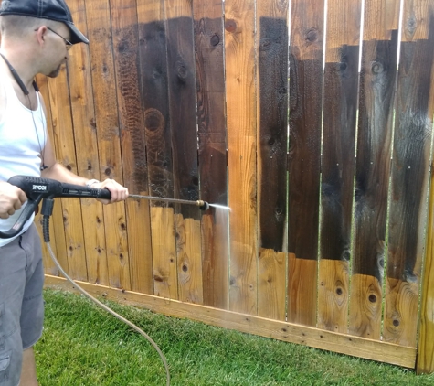 Ferrell and Son's Residential Property Maintenance. Powerwashing privacy fence  before new coat of stain is aplplyed