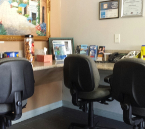 Cenco Auto Body Inc - Arcadia, CA. Waiting area has desk space to do work and is supplied with snacks.