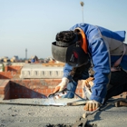 Premier Roofing Inc