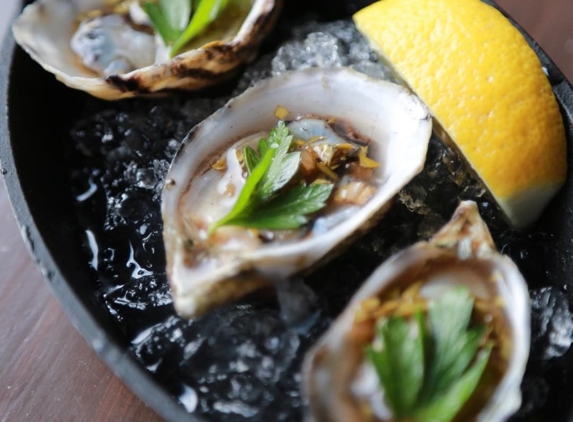 The French 75 - Edwards, CO. Oysters paired with Muscato