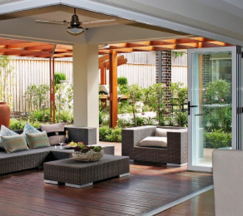 Bradnam's Windows & Doors - Ashmore, QLD. White Aluminium Corner Bi-Fold Door