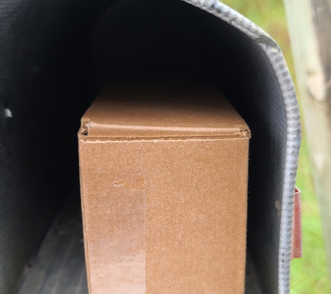 United States Postal Service - Bastrop, TX. A photo of a package I had to pick up at the PO because it was "too large" for the mailbox!  I HAD to try it, it DID fit!  GO FIGURE!