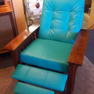 Classic House - Phoenix, AZ. This beautiful mission style recliner has been newly custom reupholstered with a turquoise Promo vinyl fabric. Its for sale on our showroom