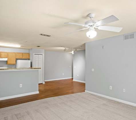 Oaks at Stone Fountain - Tampa, FL. View from Living room to kitchen and entry.