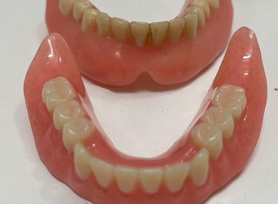 Peter Anastasia - Waterford West, QLD. My new beautiful teeth Peter made look so natural