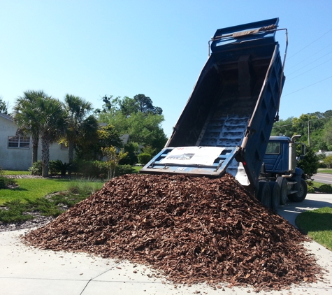 Sun Power Lawn Care - Gainesville, FL. Dropping off mulch in Gainesville fl