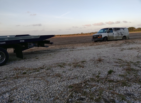 Palm Beach Finest Towing Inc - West Palm Beach, FL. What street is close to tow truck I was about Paris 12 feet away from where he parked