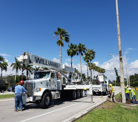 Williams International - Deerfield Beach, FL. 38 Ton Peterbilt mounted Altec Boom Truck Crane setting poles on Copans, Pompano Beach.